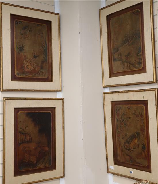 A set of four 19th century chinoiserie lacquer panels